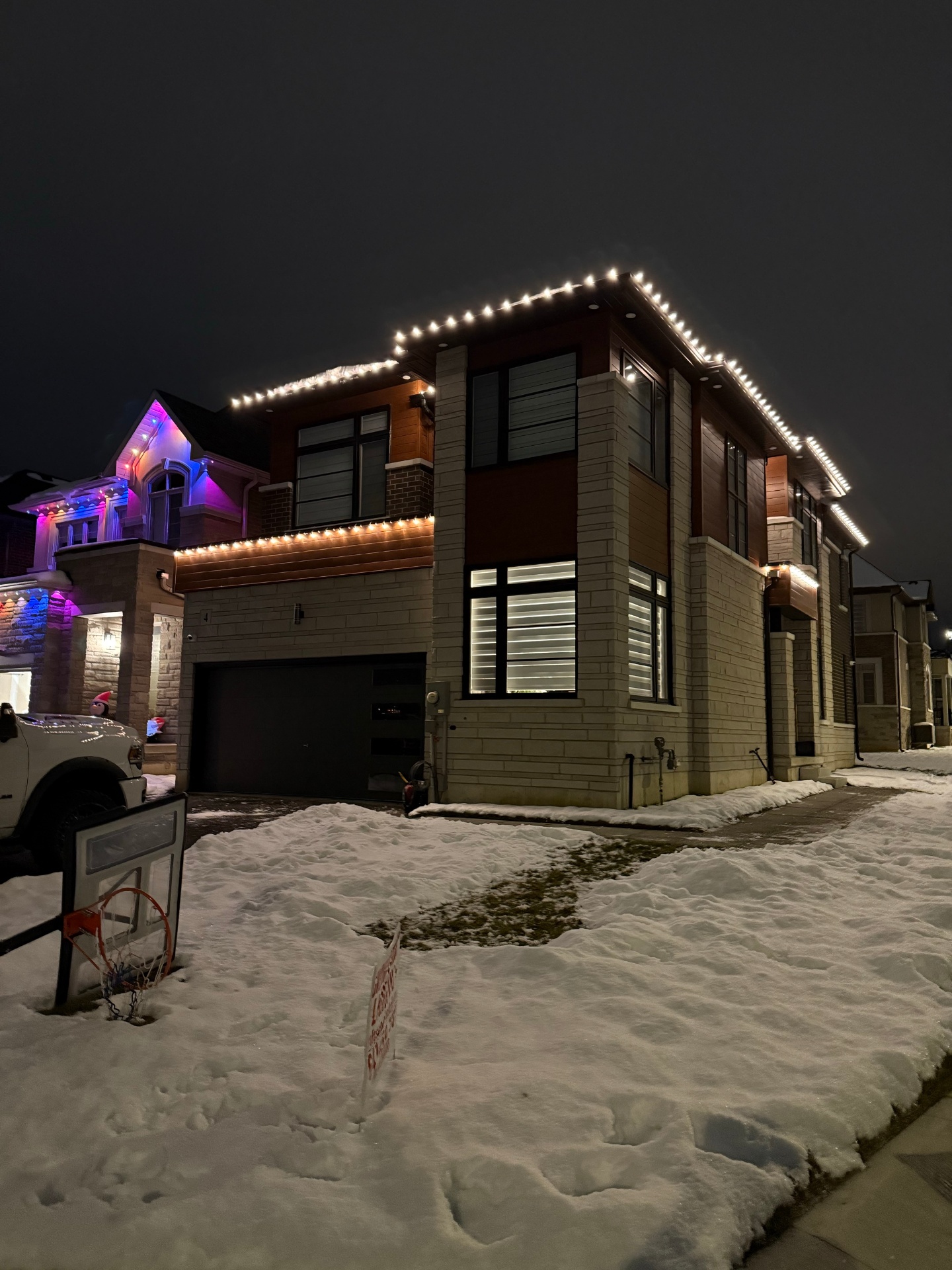 Professional C9 Christmas light roofline installation on a Hamilton home